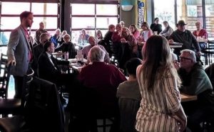 Eli Woody meets with Crawford County Democrats at the Jolly Fox Brewery in Pittsburg, Kansas